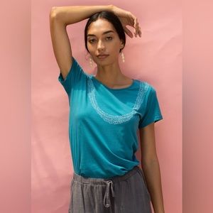 Brand new still in packaging Mahina made lei pikake shirt in Kai color. Medium